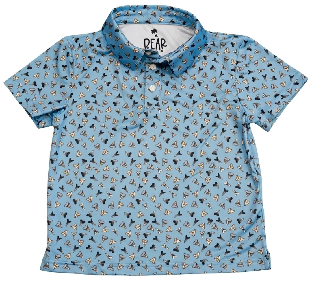 Blue kids polo with shark teeth print
