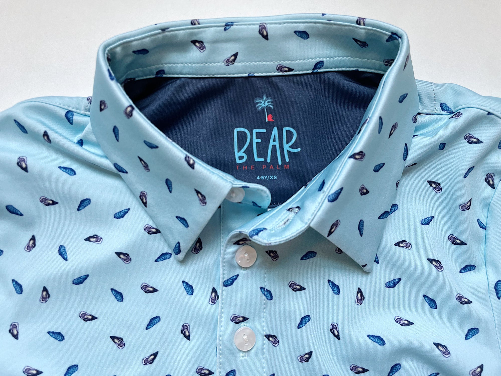 fun oyster print junior polo